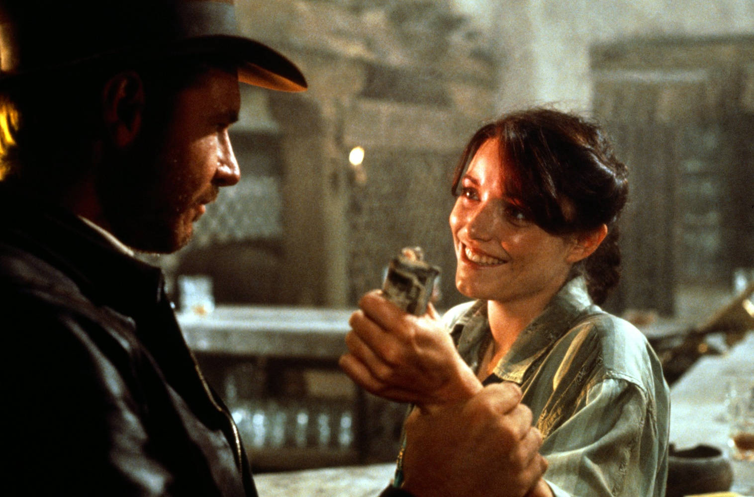 Karen Allen And Harrison Ford Scene Background