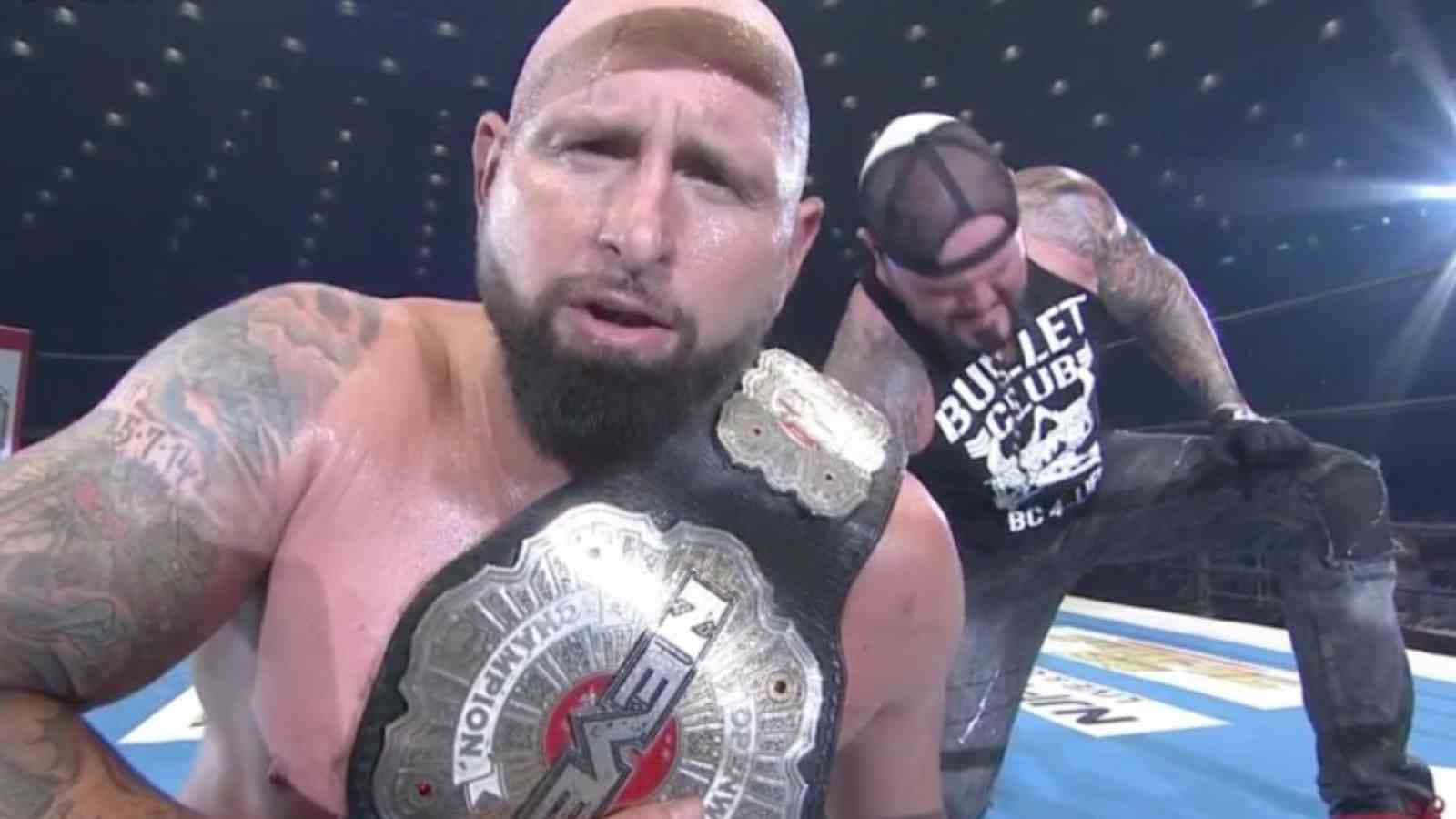 Karl Anderson With His Championship Belt Background