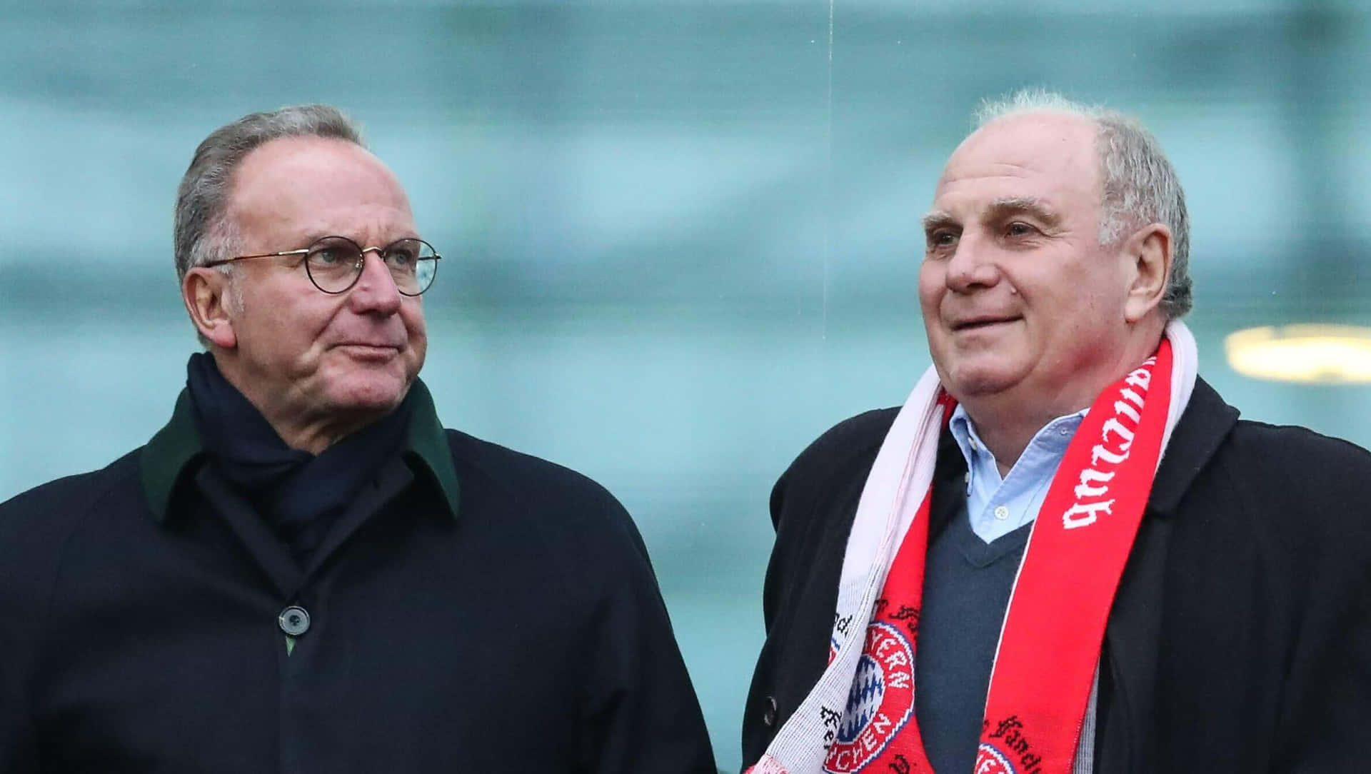 Karl-heinz Rummenigge And Uli Hoeness In Hdi Arena Background