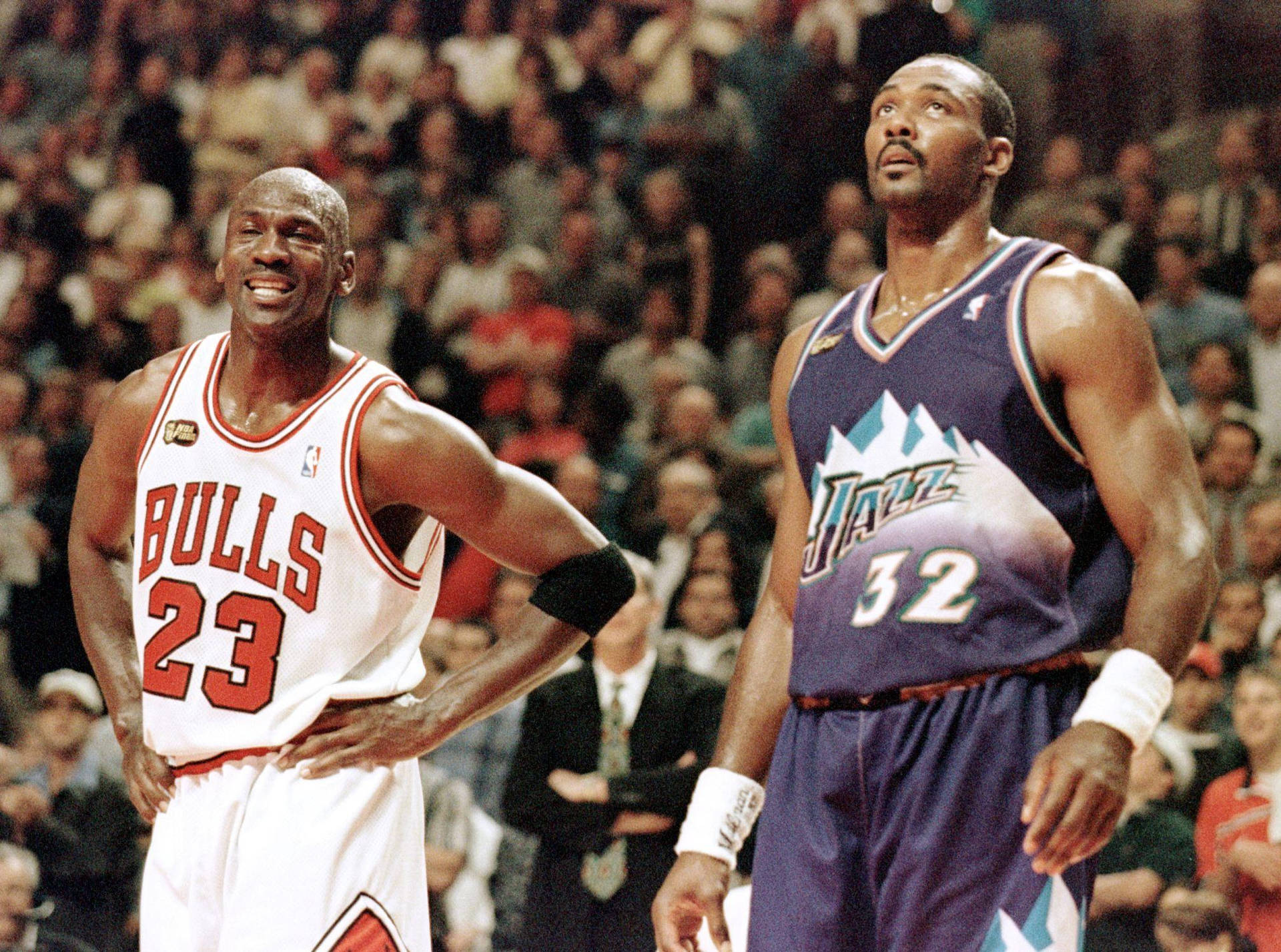 Karl Malone With His Opponent Michael Jordan