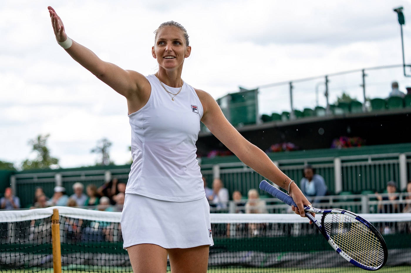 Karolina Pliskova Waving To Fans Background