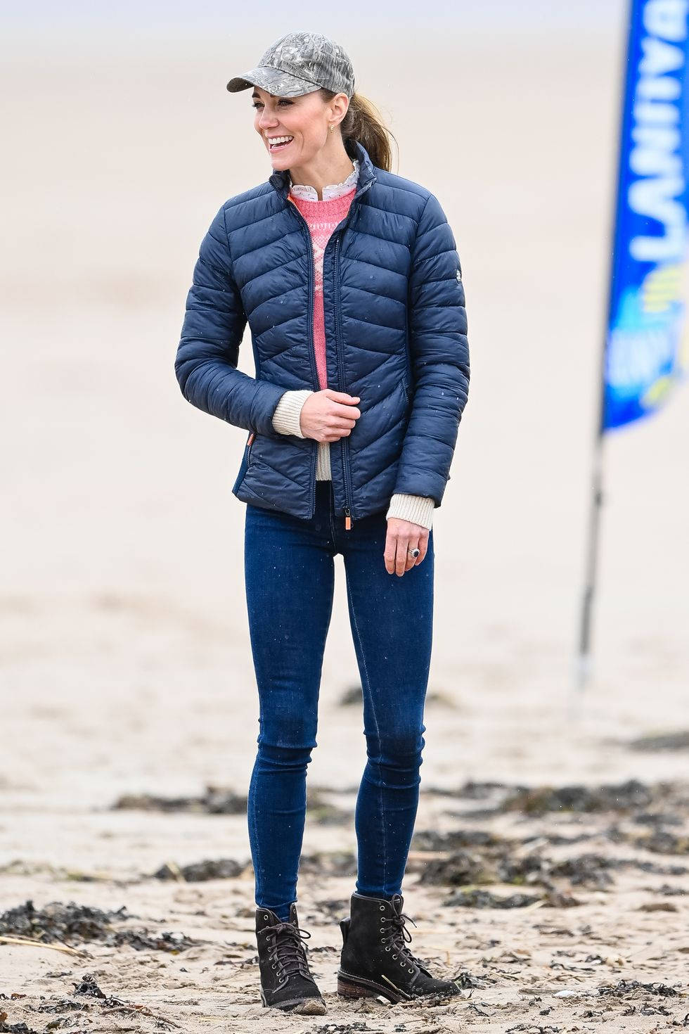 Kate Middleton In Navy Puffer Background