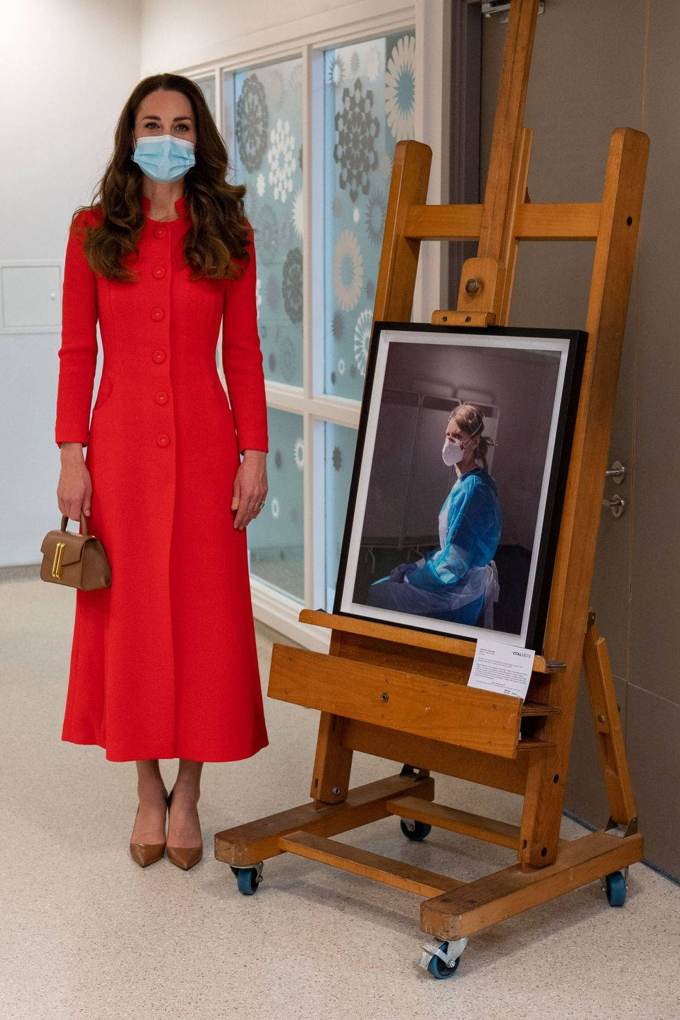 Kate Middleton In Red-orange Coat Background