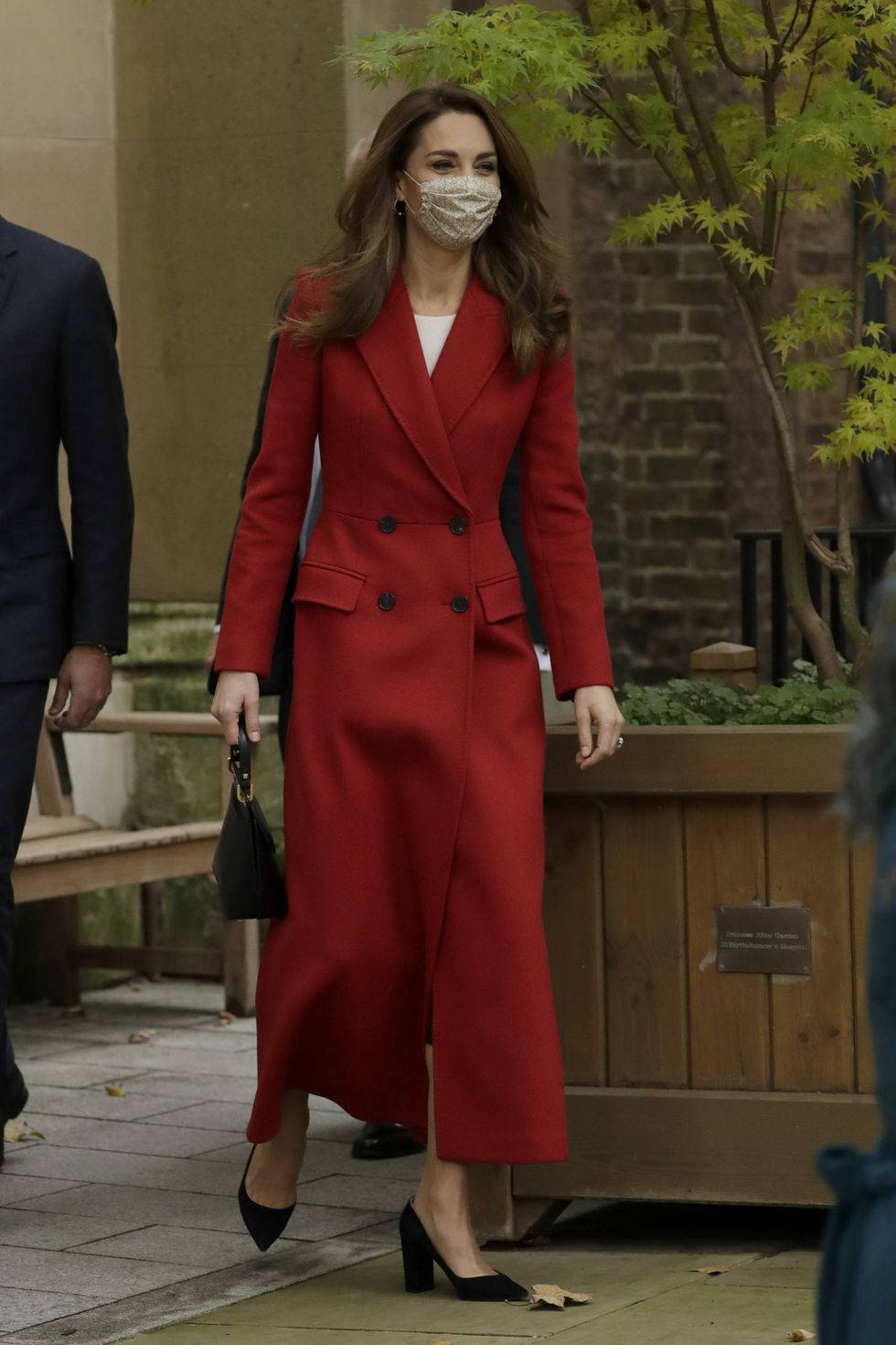 Kate Middleton In Red Overcoat Background