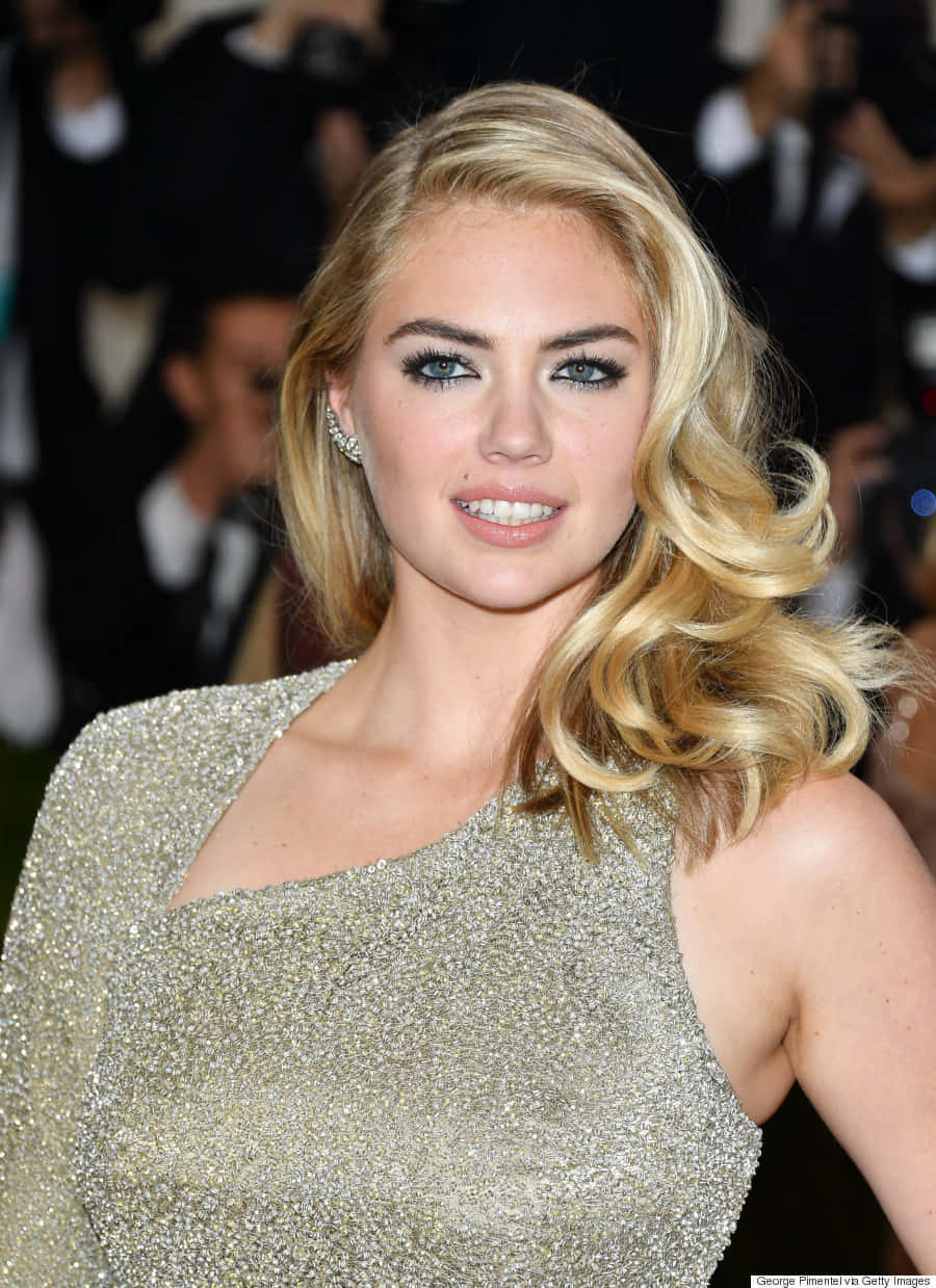 Kate Upton Looking Stunning And Confident Background