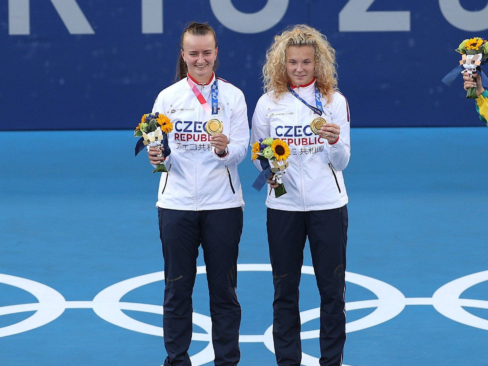 Katerina Siniakova And Barbora Krejcikova Medals Background