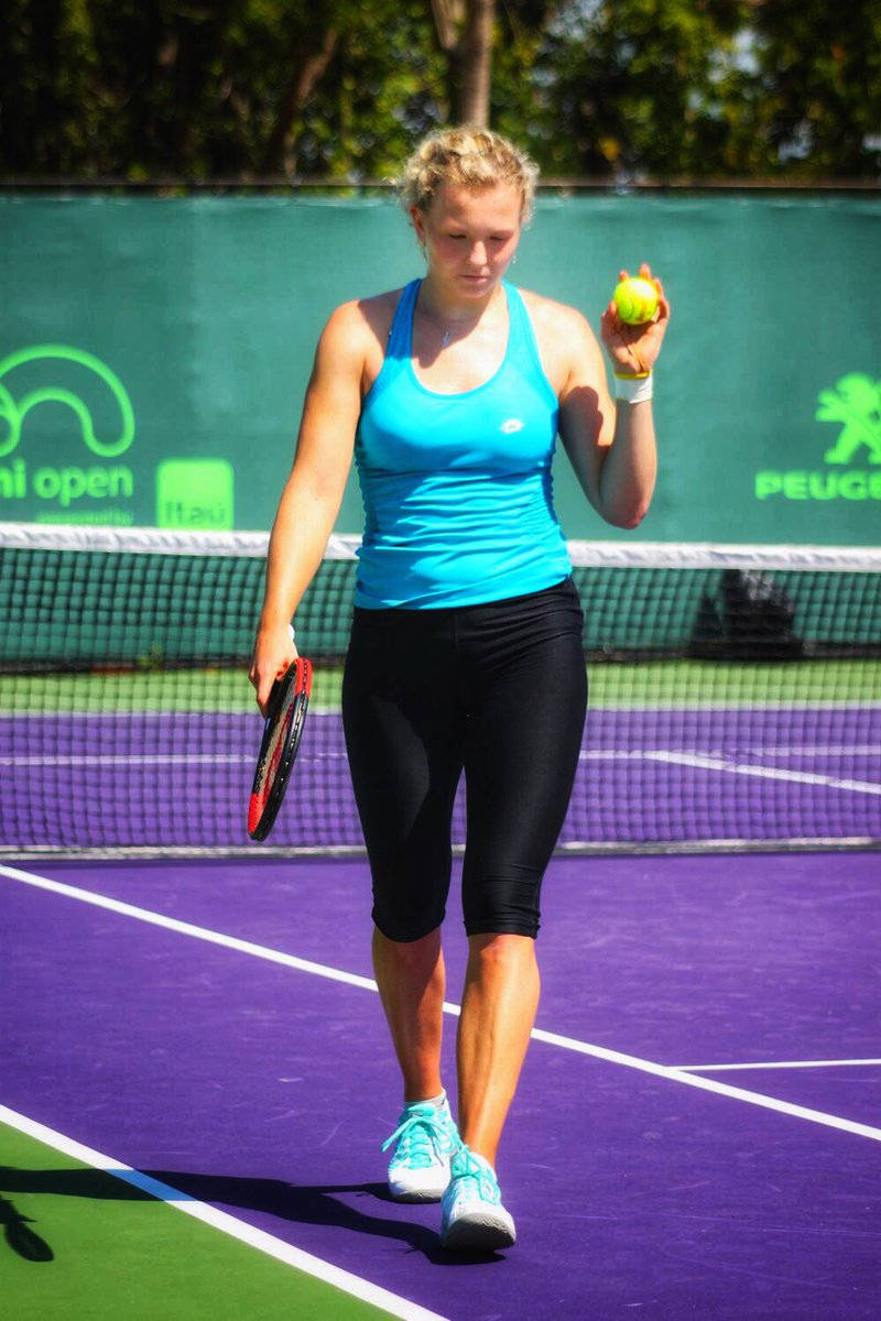 Katerina Siniakova Holding The Ball Background