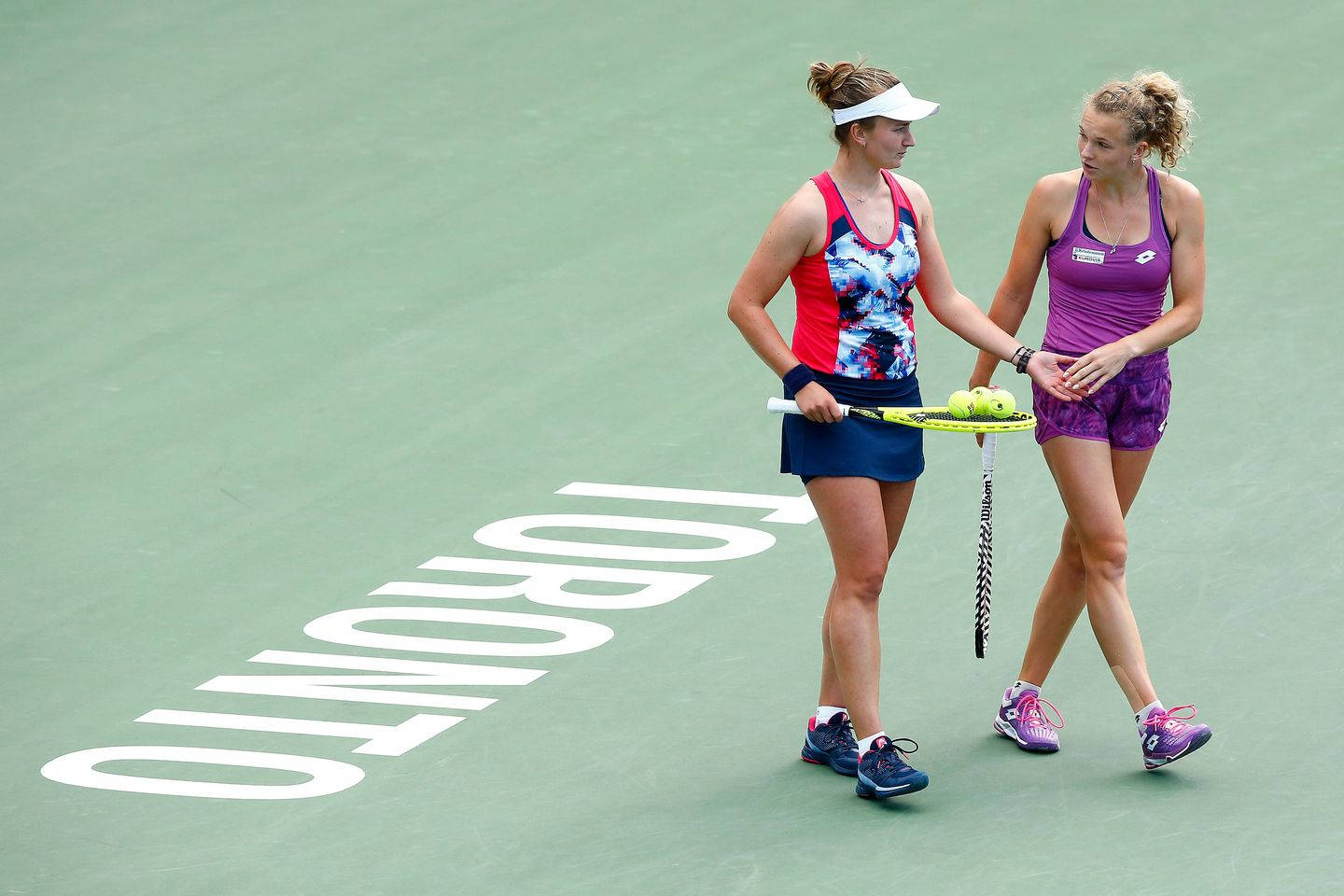 Katerina Siniakova Walking With Barbora Krejcikova Background