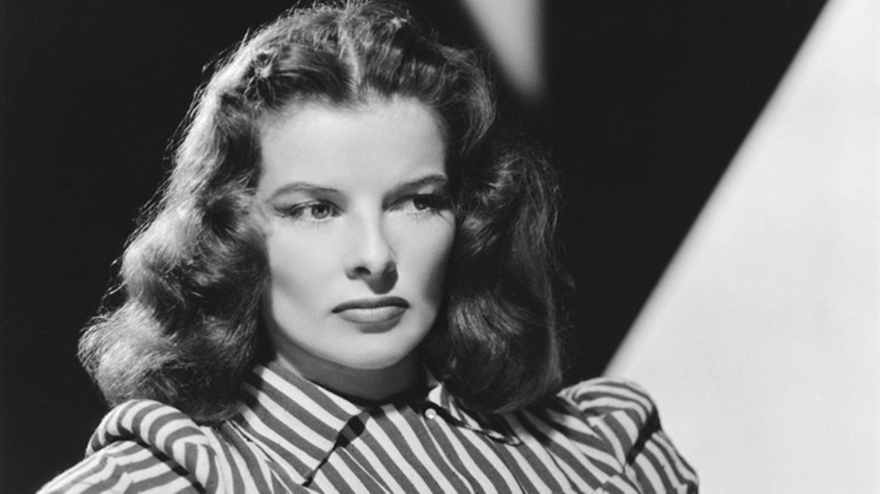 Katharine Hepburn On A Striped Top Background