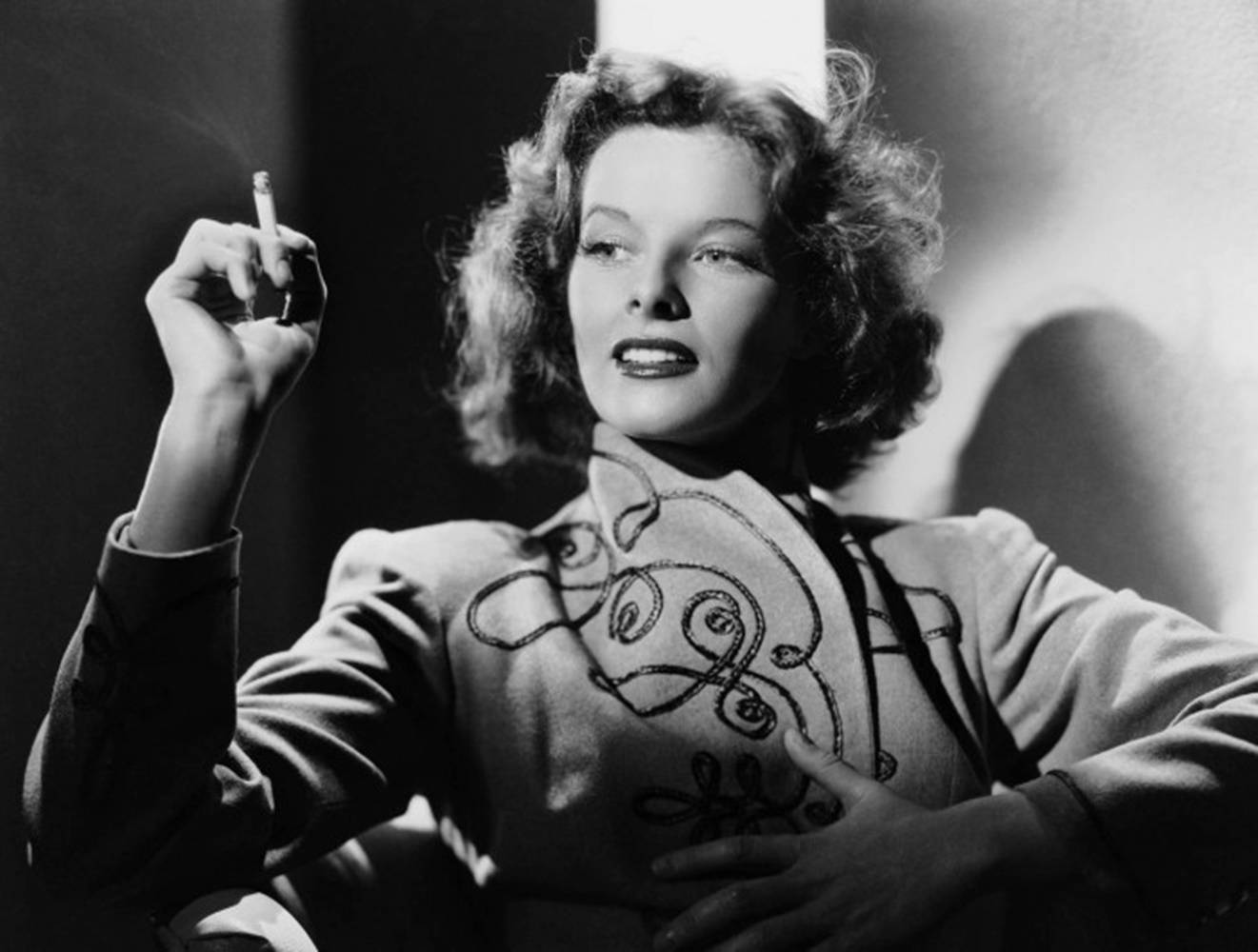 Katharine Hepburn With A Cigar Background