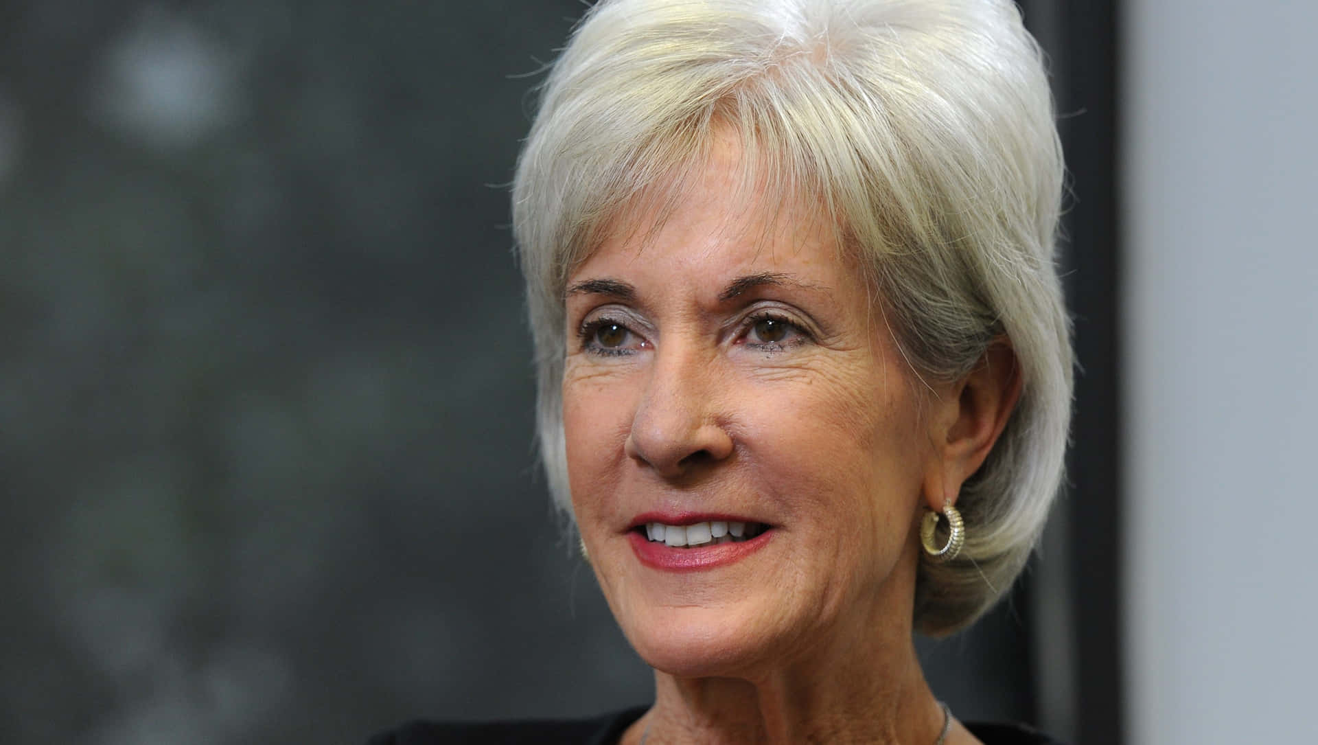 Kathleen Sebelius, Former Us Secretary Of Health Attending A Public Event Background
