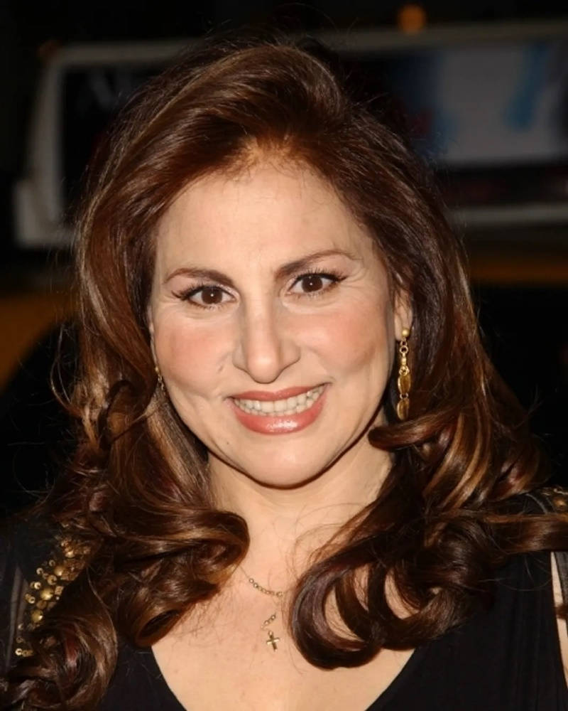 Kathy Najimy Glowing Wavy Brown Hair Background