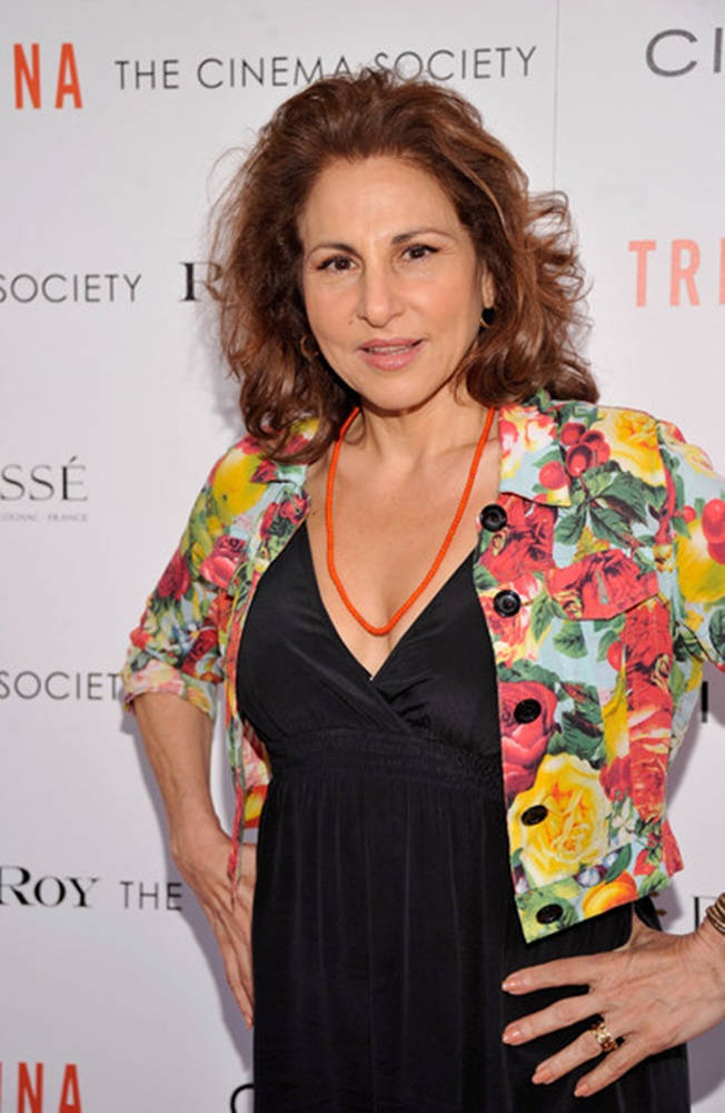 Kathy Najimy In A Floral Polo Background