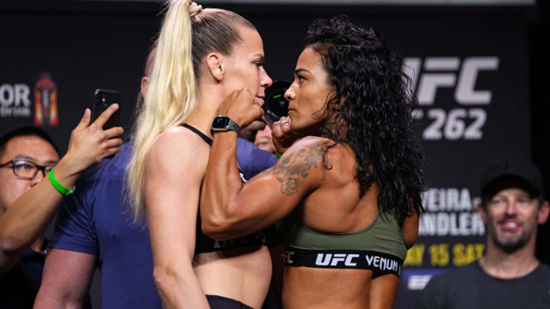 Katlyn Chookagian And Viviane Araujo Face-off Background