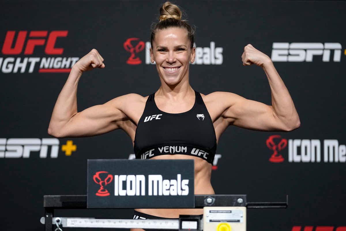 Katlyn Chookagian Flexing With A Smile Background