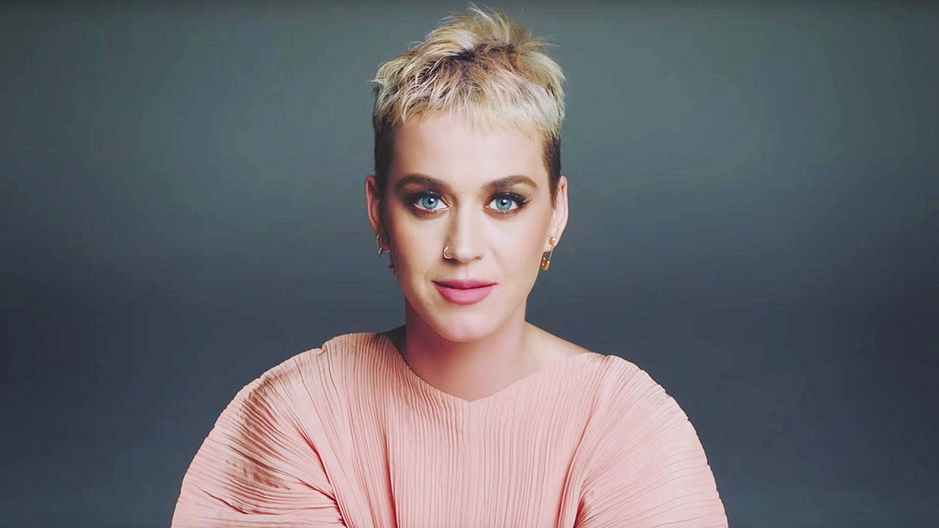 Katy Perry Smiles Brightly During Her Pixie Cut Photoshoot Background