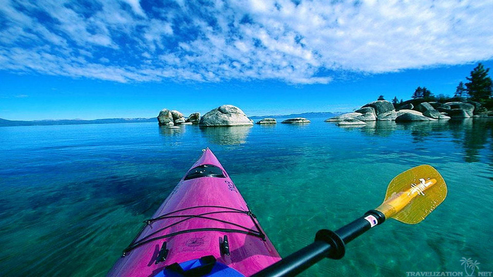 Kayaking By A Rock Formation