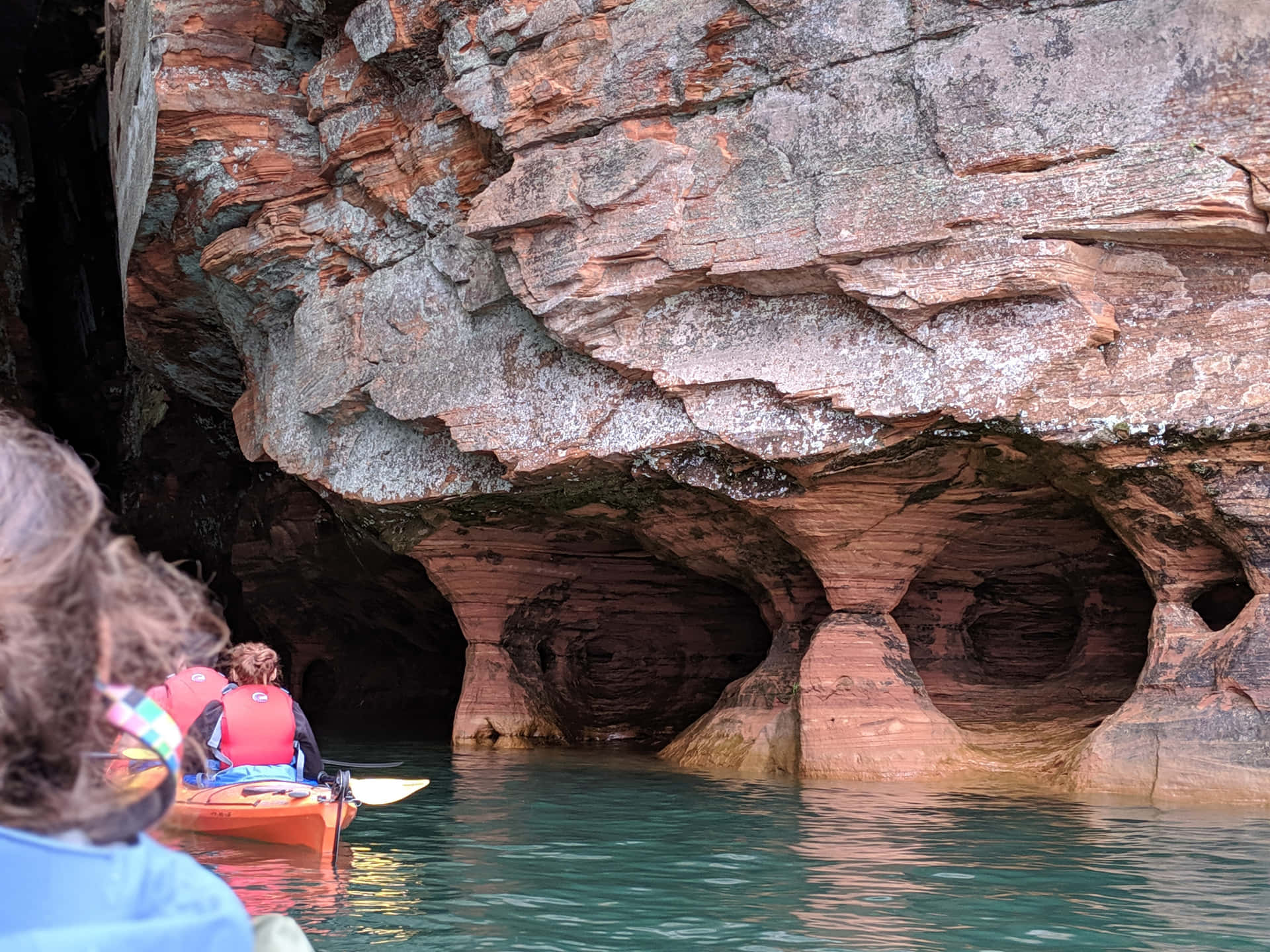 Kayaking Near Sea Caves Background