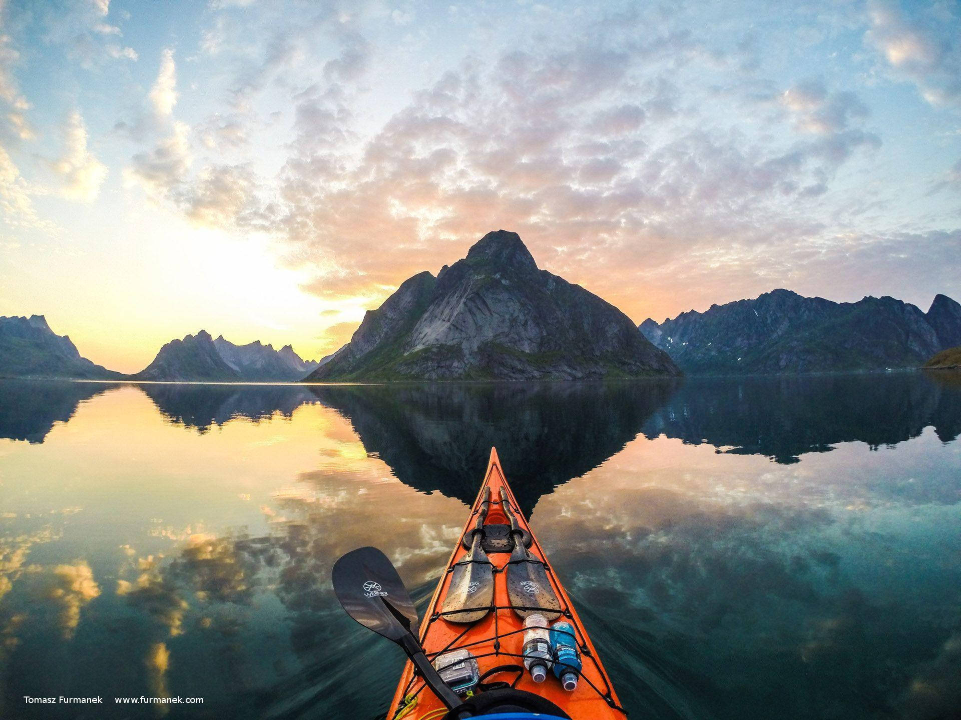 Kayaking Over Reflective Water Background