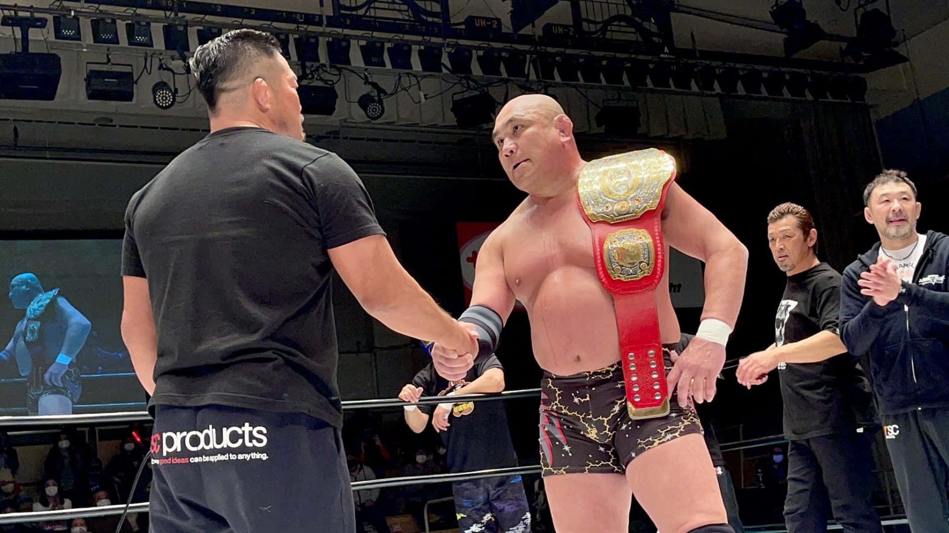 Kazuyuki Fujita Holding The Ghc National Championship Trophy Background