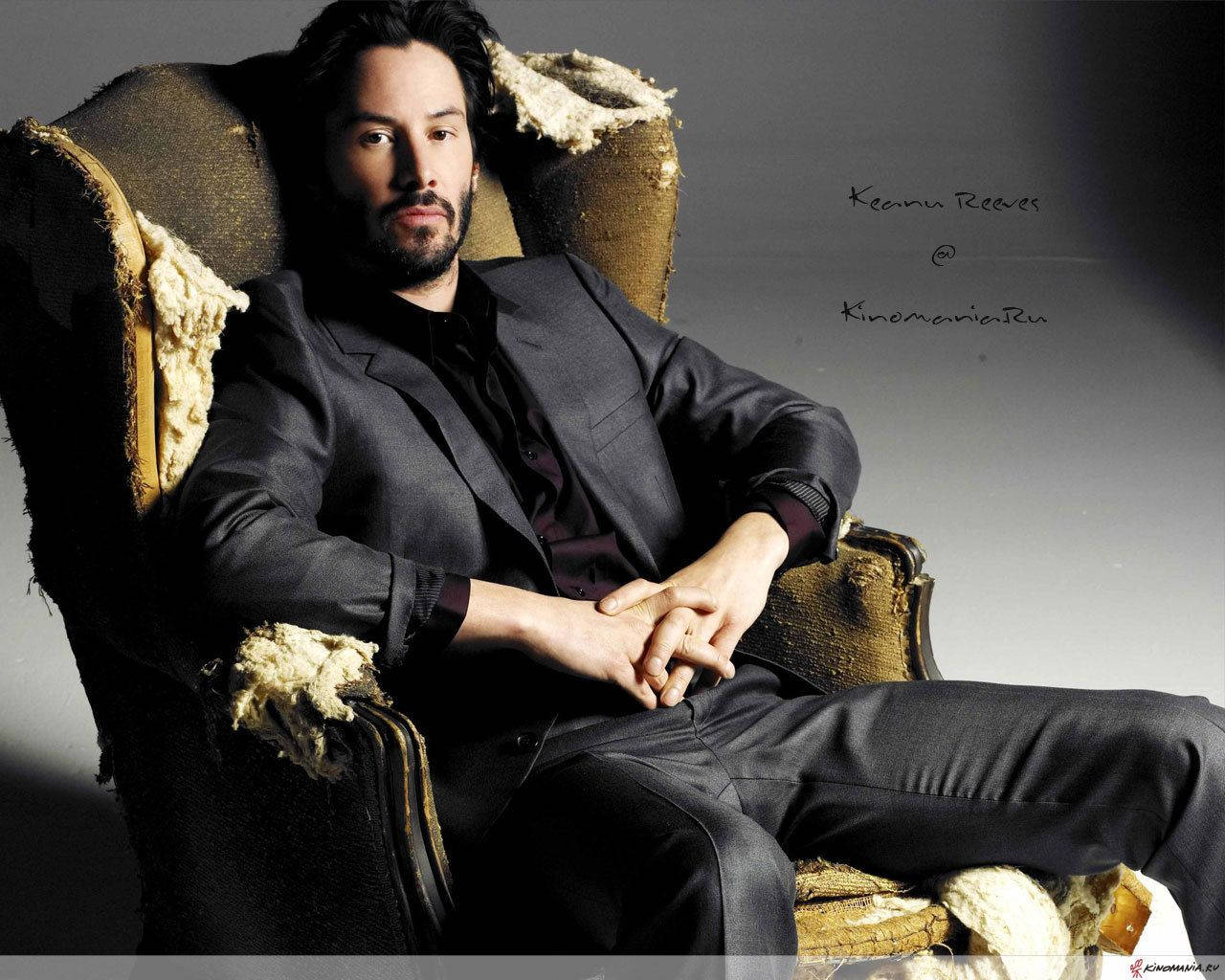 Keanu Reeves On Black Suit Background