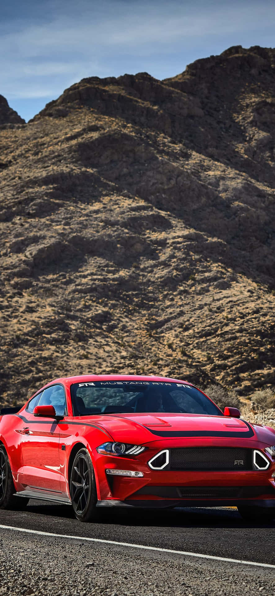 Keep Up With The Trends With The Sleek Design Of A Mustang Iphone Background