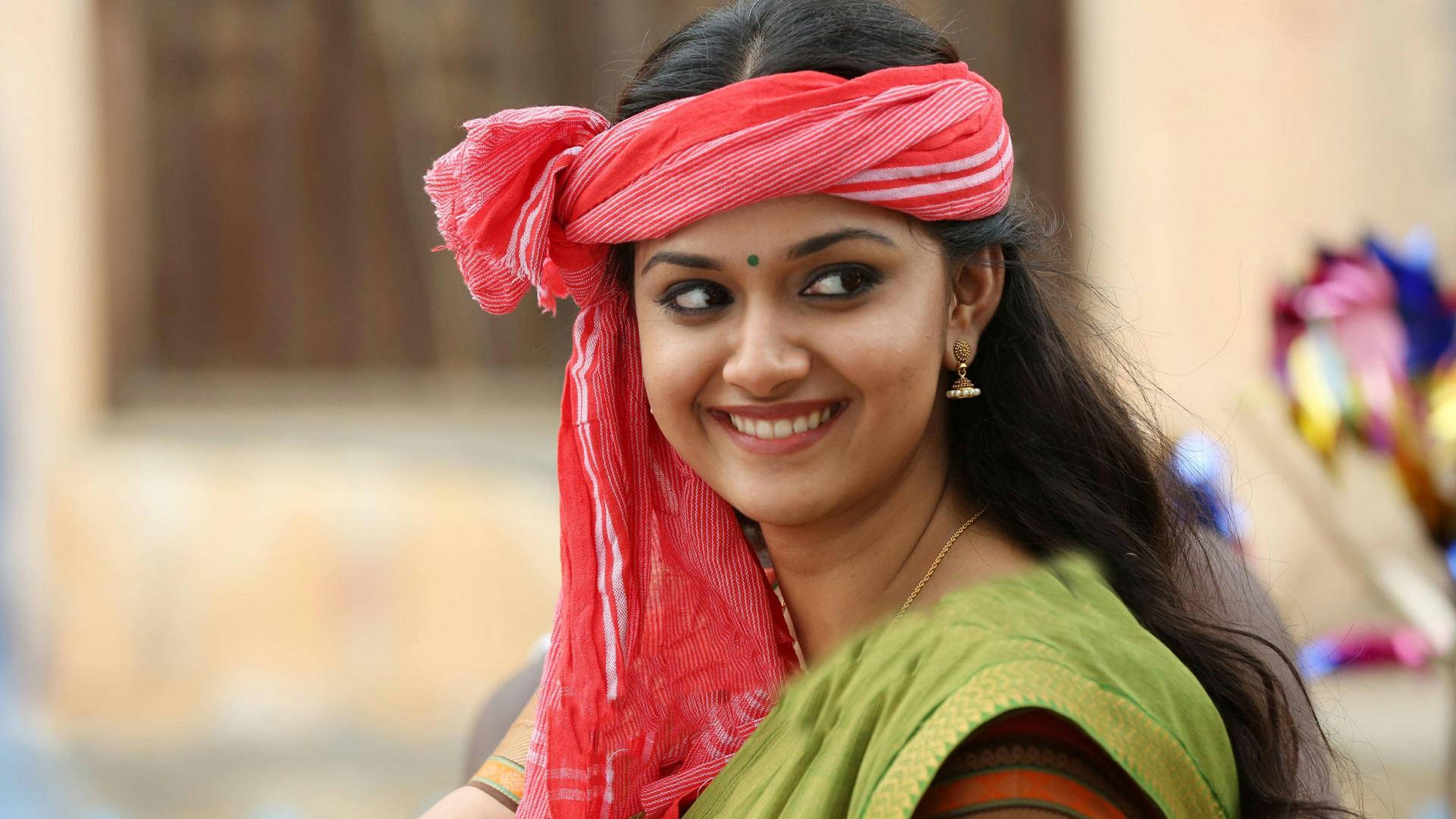 Keerthi Suresh Dazzling In Red Headband Hd Image Background
