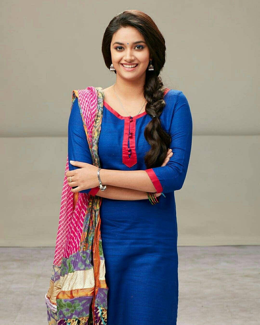 Keerthi Suresh In Blue Dress And Pink Sari Hd Background