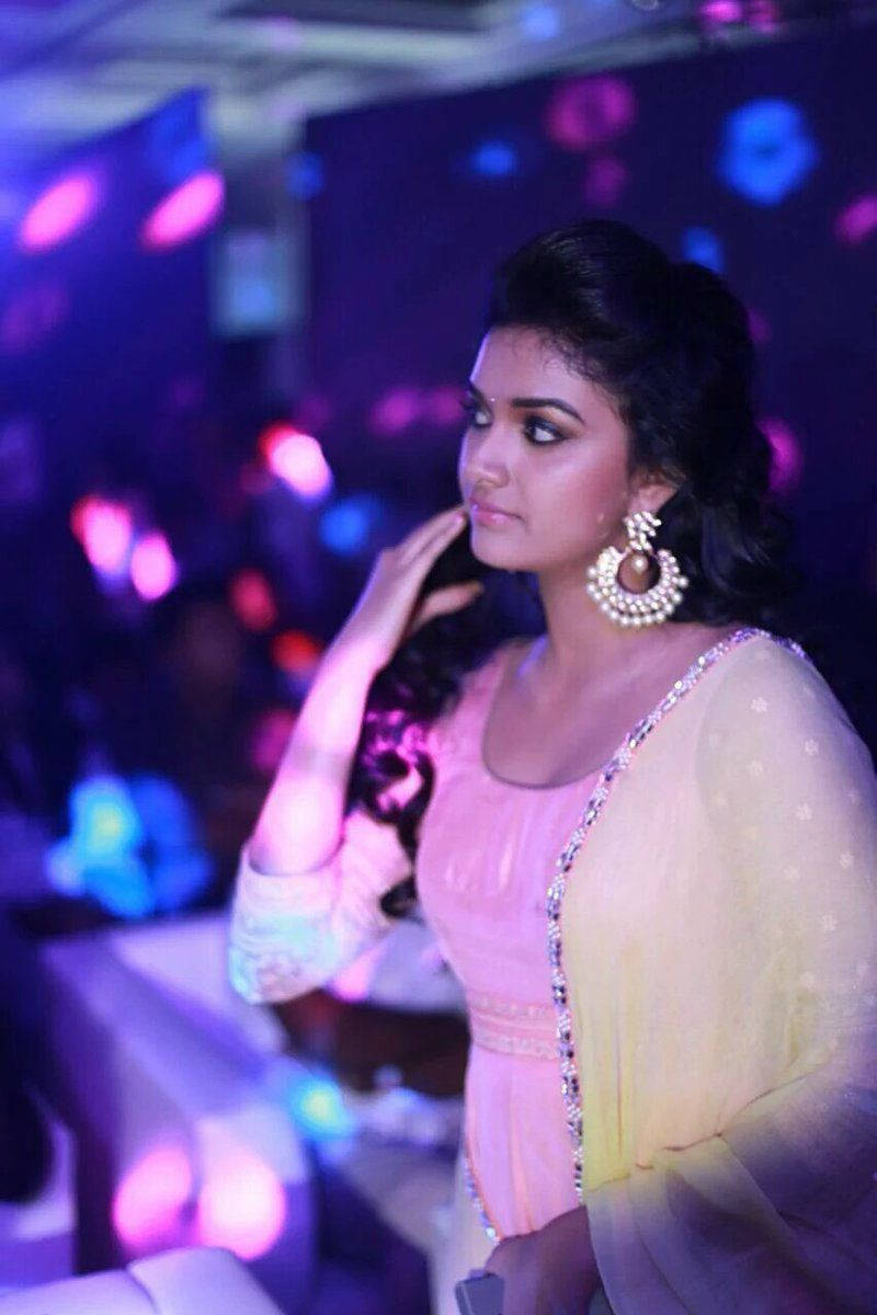 Keerthi Suresh Surrounded By Lights Hd Background