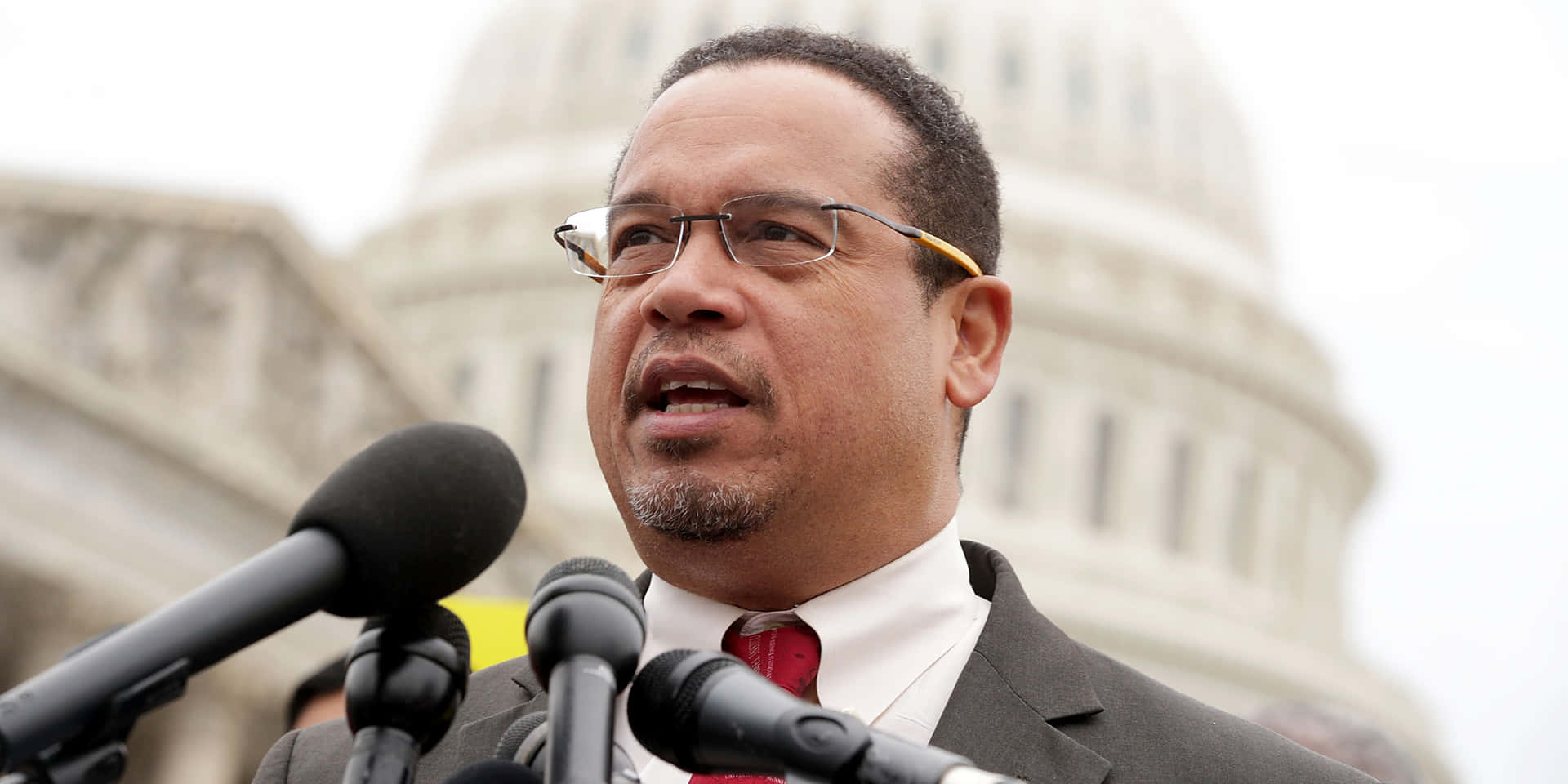 Keith Ellison In Front Of Us Capitol Building Background