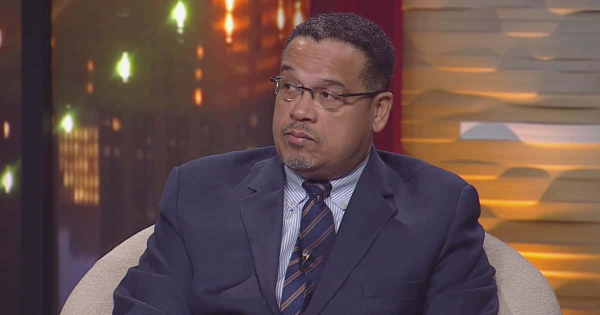 Keith Ellison Sitting During Live Interview Background