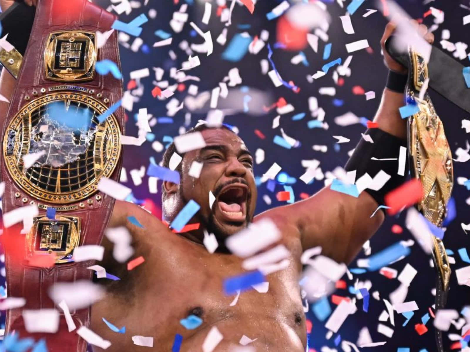 Keith Lee Celebrates Wwe Nxt Championship Background