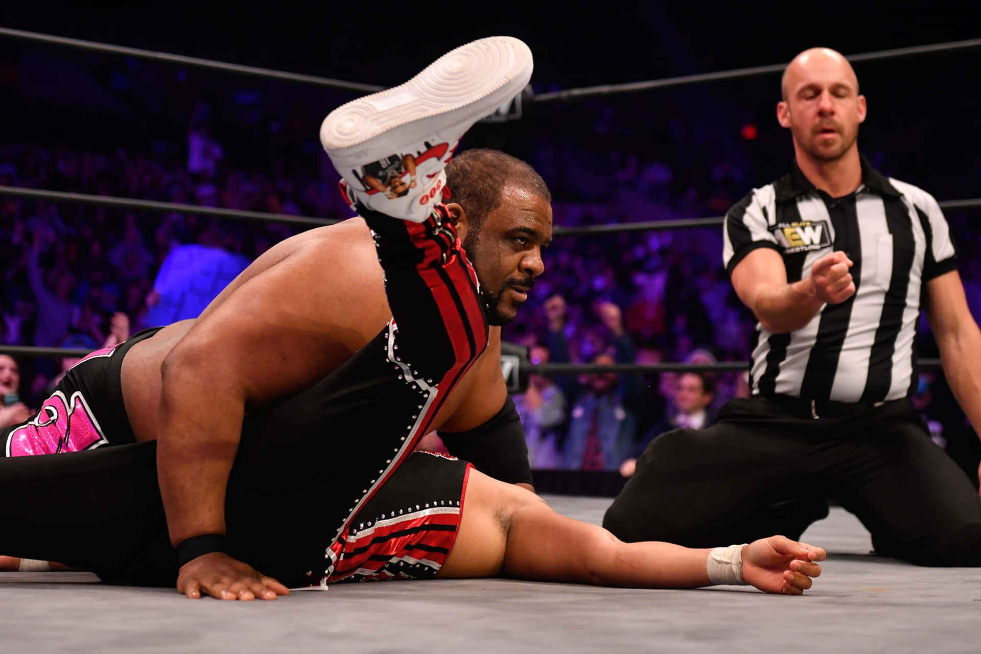 Keith Lee Locking Isiah Kassidy Wwe Match Background