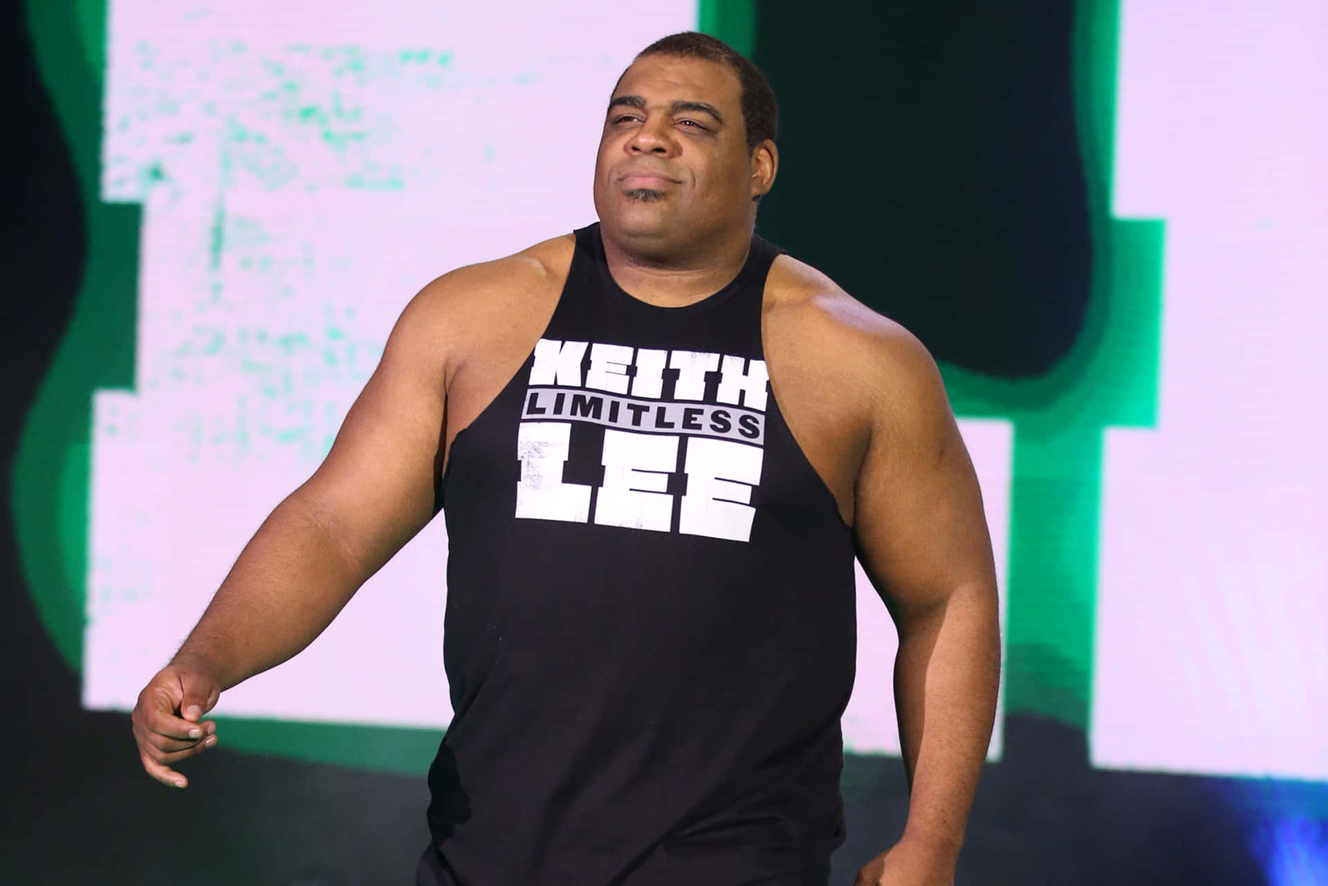Keith Lee - The Limitless One In Black Singlet Background