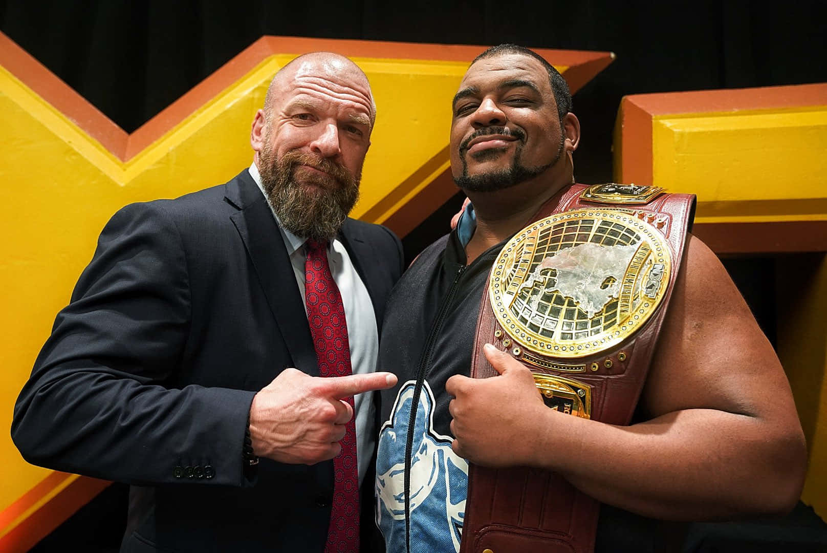 Keith Lee With Triple H Wwe Nxt Champion Background