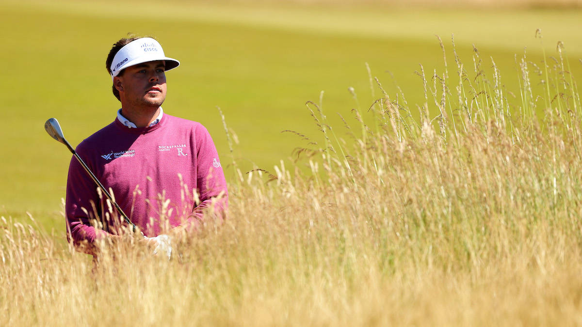 Keith Mitchell In A Field Background