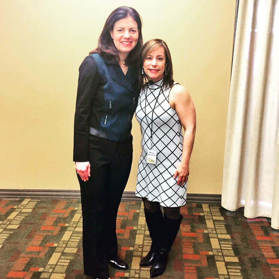 Kelly Ayotte Posing With Female Supporter Background