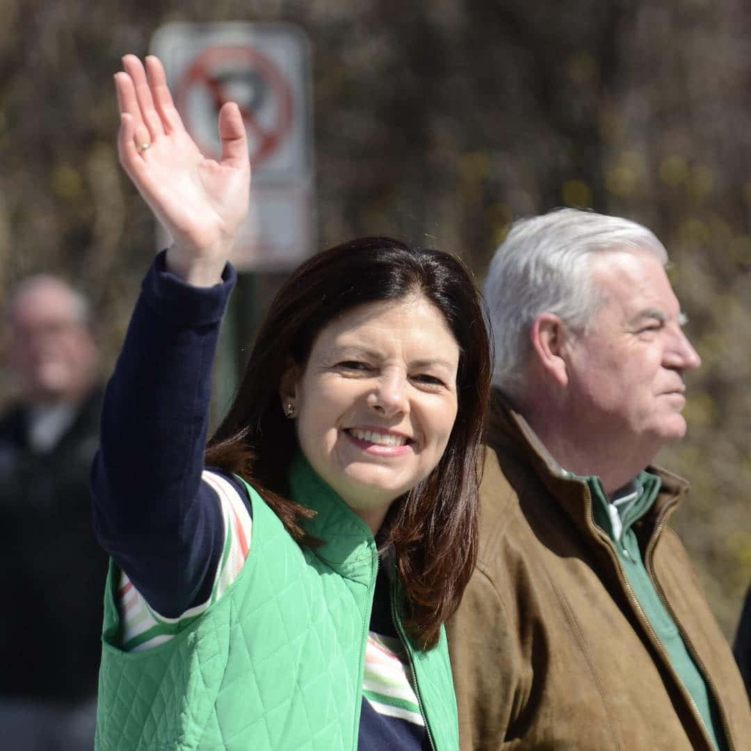 Kelly Ayotte Waving Background
