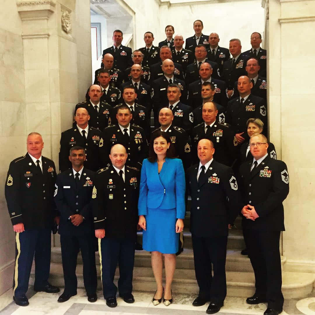 Kelly Ayotte With Nh National Guard Background