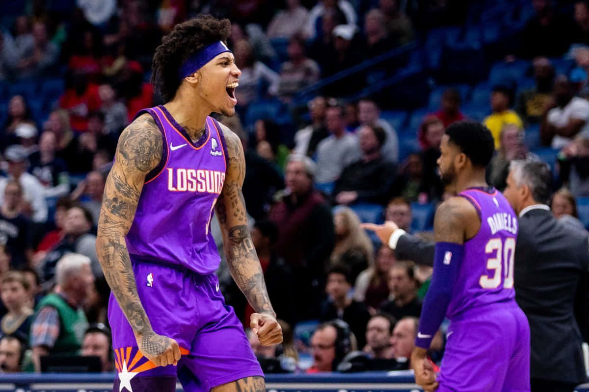 Kelly Oubre Jr. Cheering With Joy Background