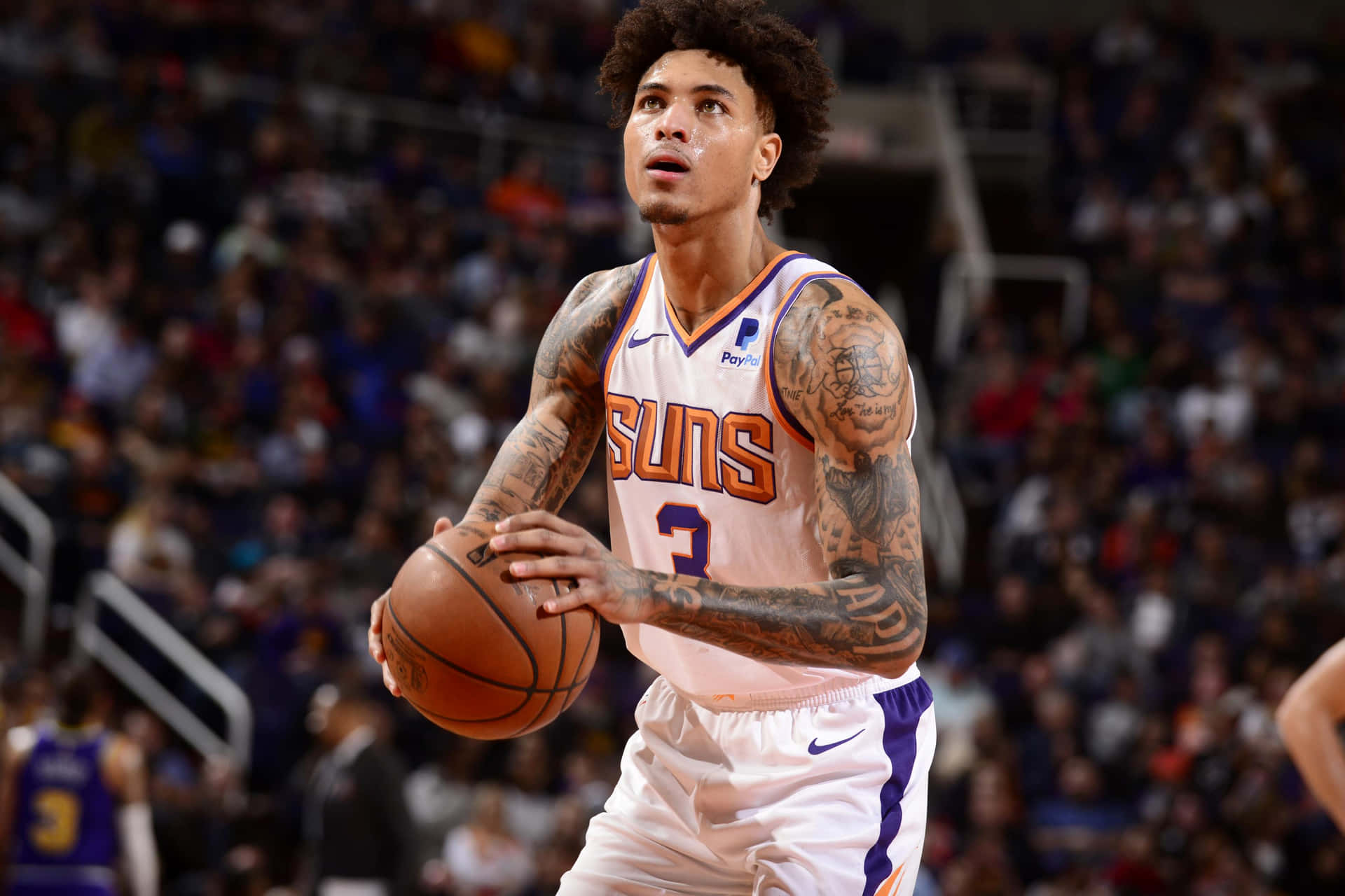 Kelly Oubre Jr Showing Off His Skills On The Court Background