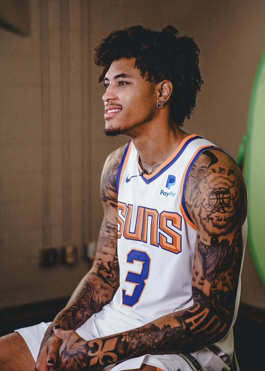 Kelly Oubre Jr Tattooed Arms Background