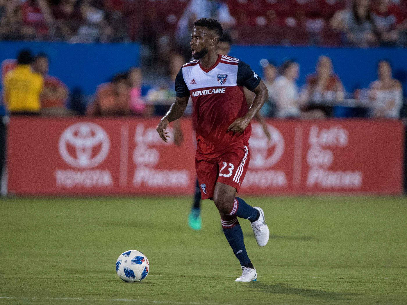 Kellyn Acosta Football Running Ny Red Bulls Background