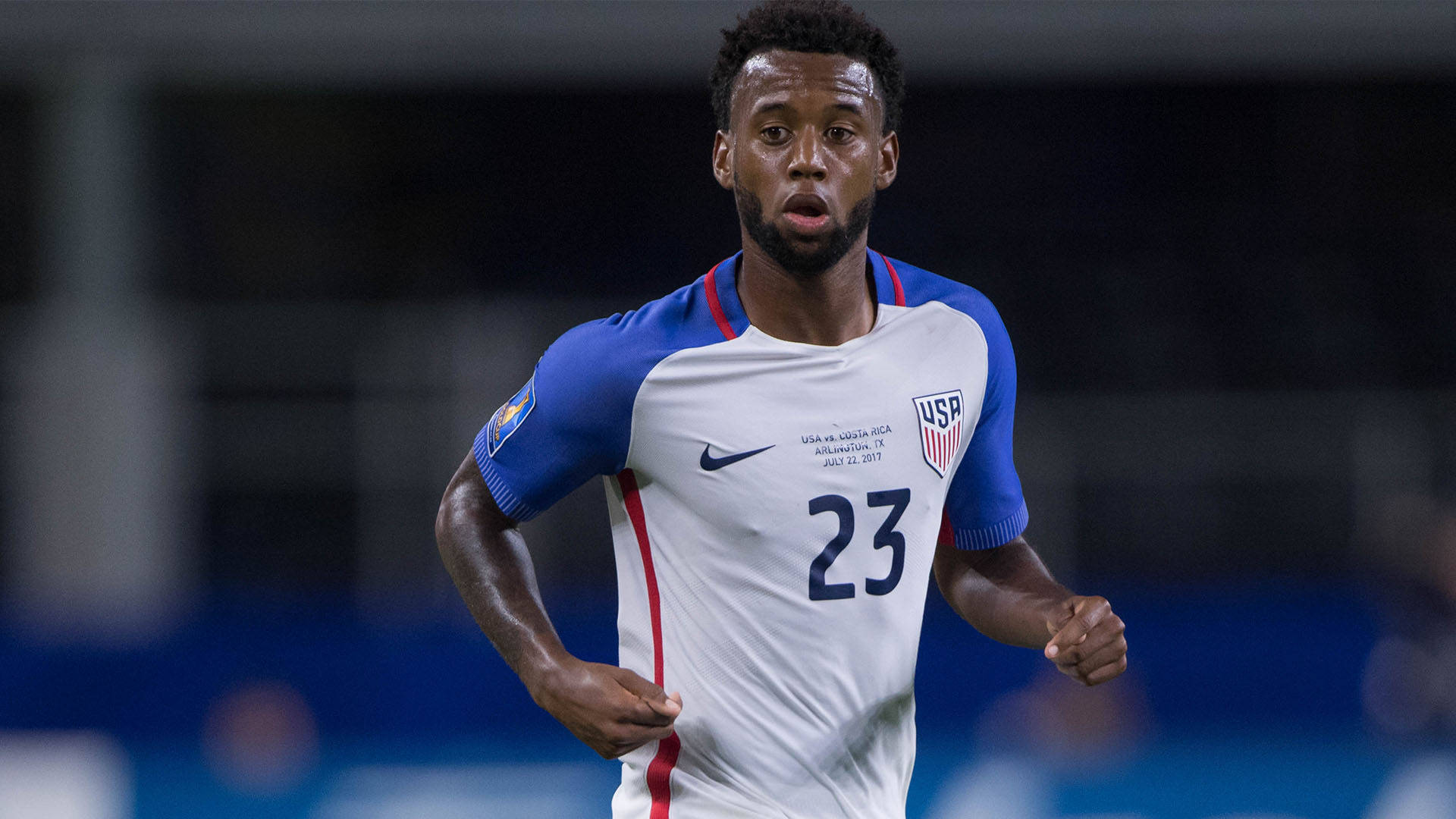 Kellyn Acosta In Action During The United States Vs Portugal Match Background