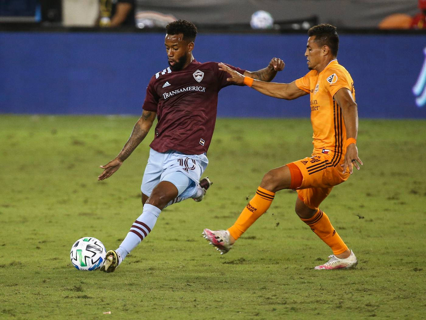 Kellyn Acosta Kicking Ball Colorado Rapids Background