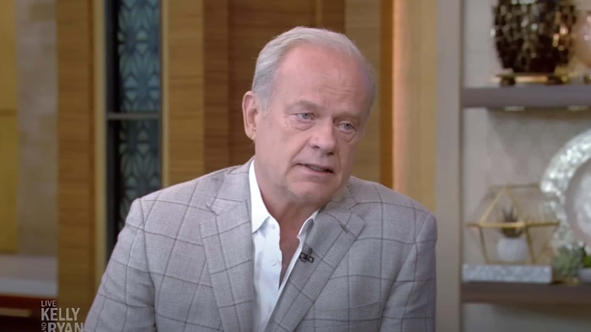 Kelsey Grammer Contemplating In Thought Background