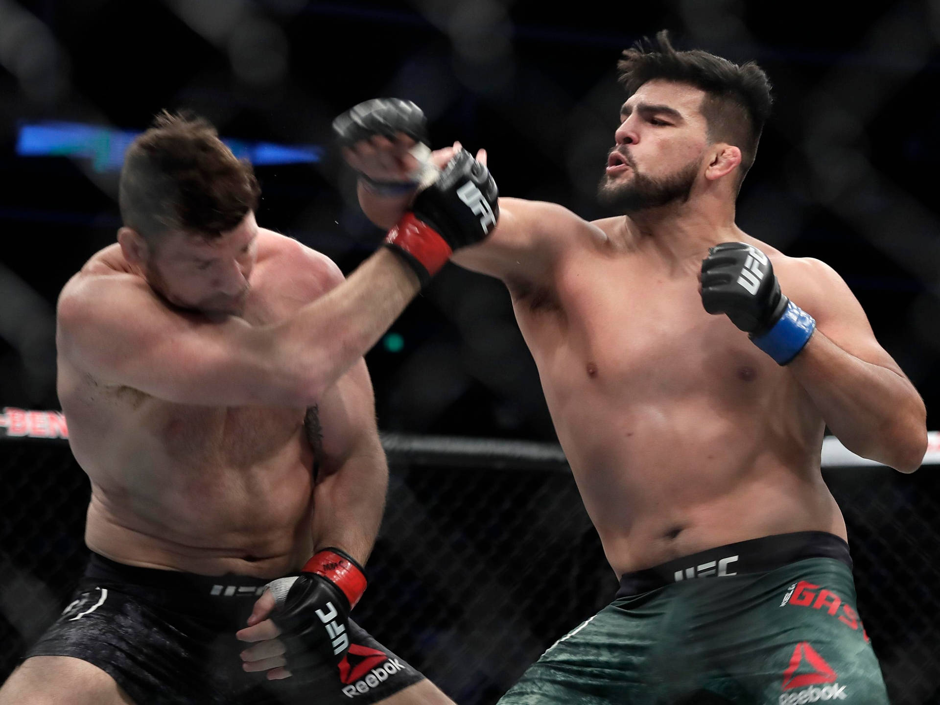 Kelvin Gastelum In Action In Mma Fight Background