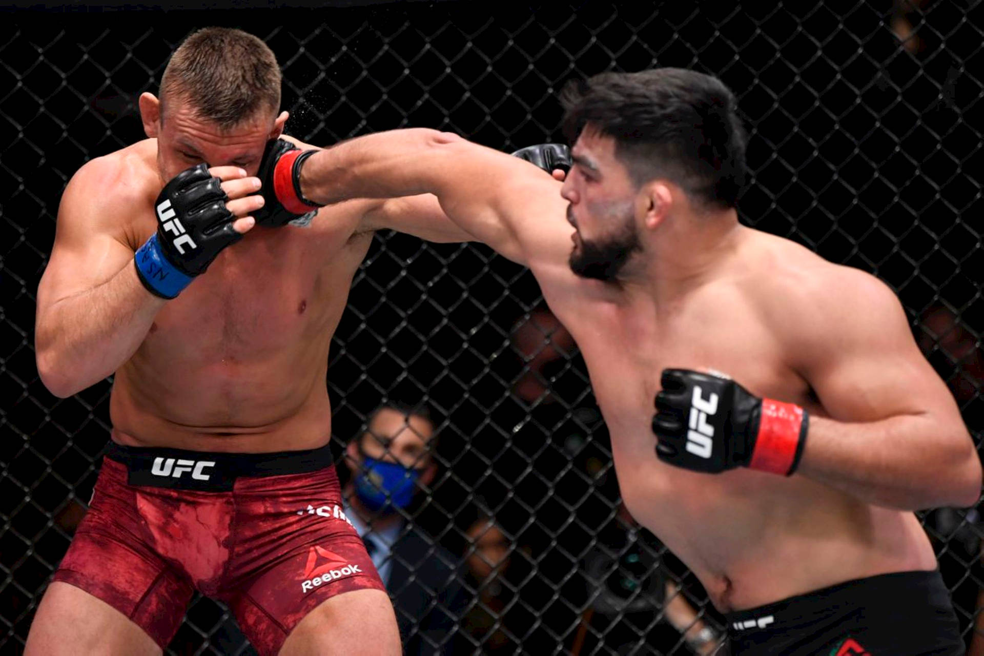 Kelvin Gastelum Punching Opponent Background