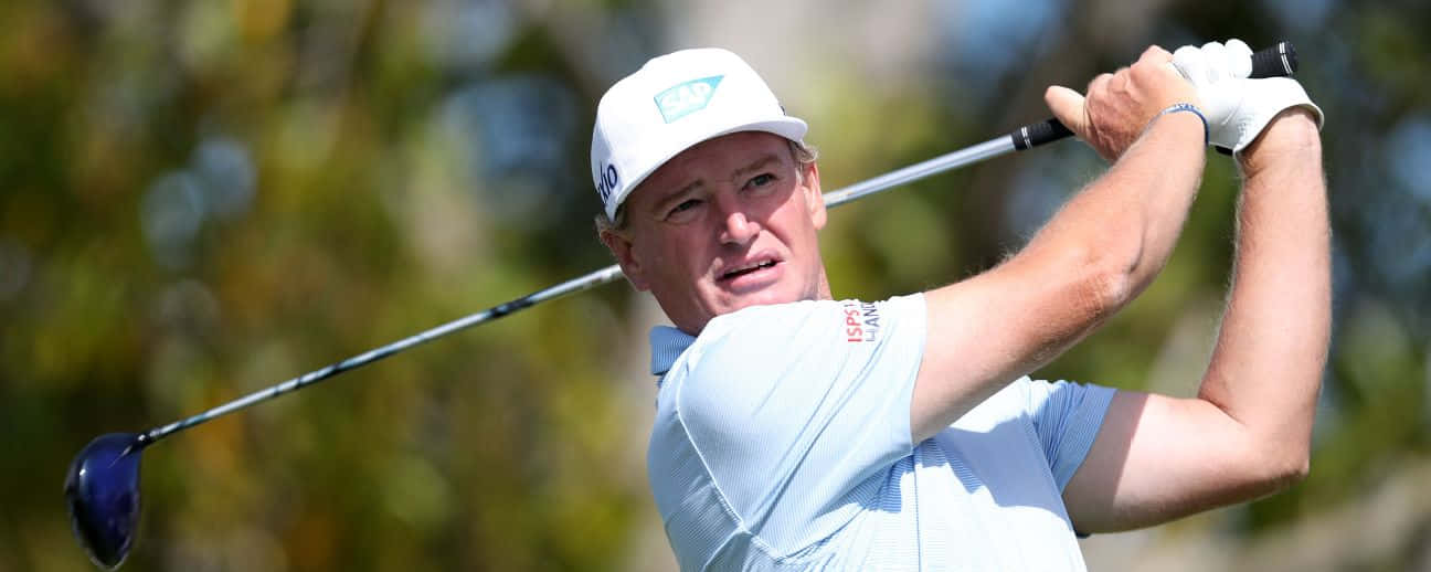 Ken Duke Golfing In The Sun Background