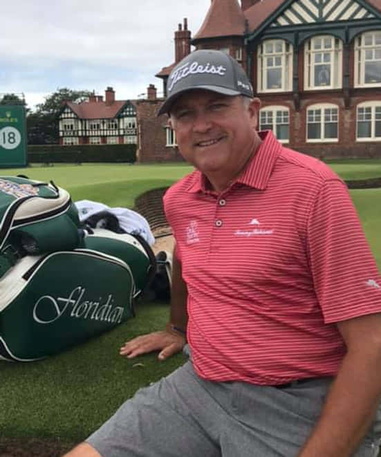 Ken Duke Sitting And Posing Background